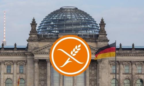 Bild des Bundestages in Berlin mit unseren Logo der durchgestrichenen Ähre